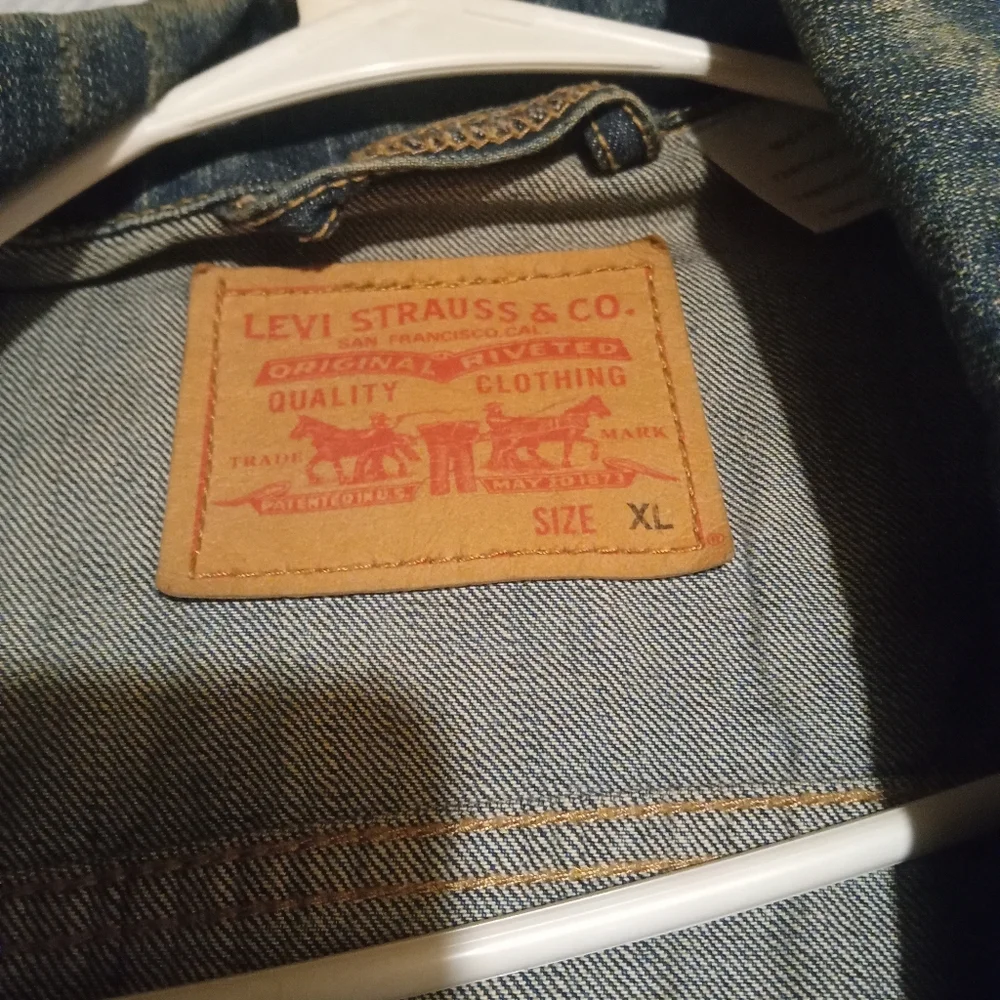 Levi's Faded Blue Denim Trucker Jacket